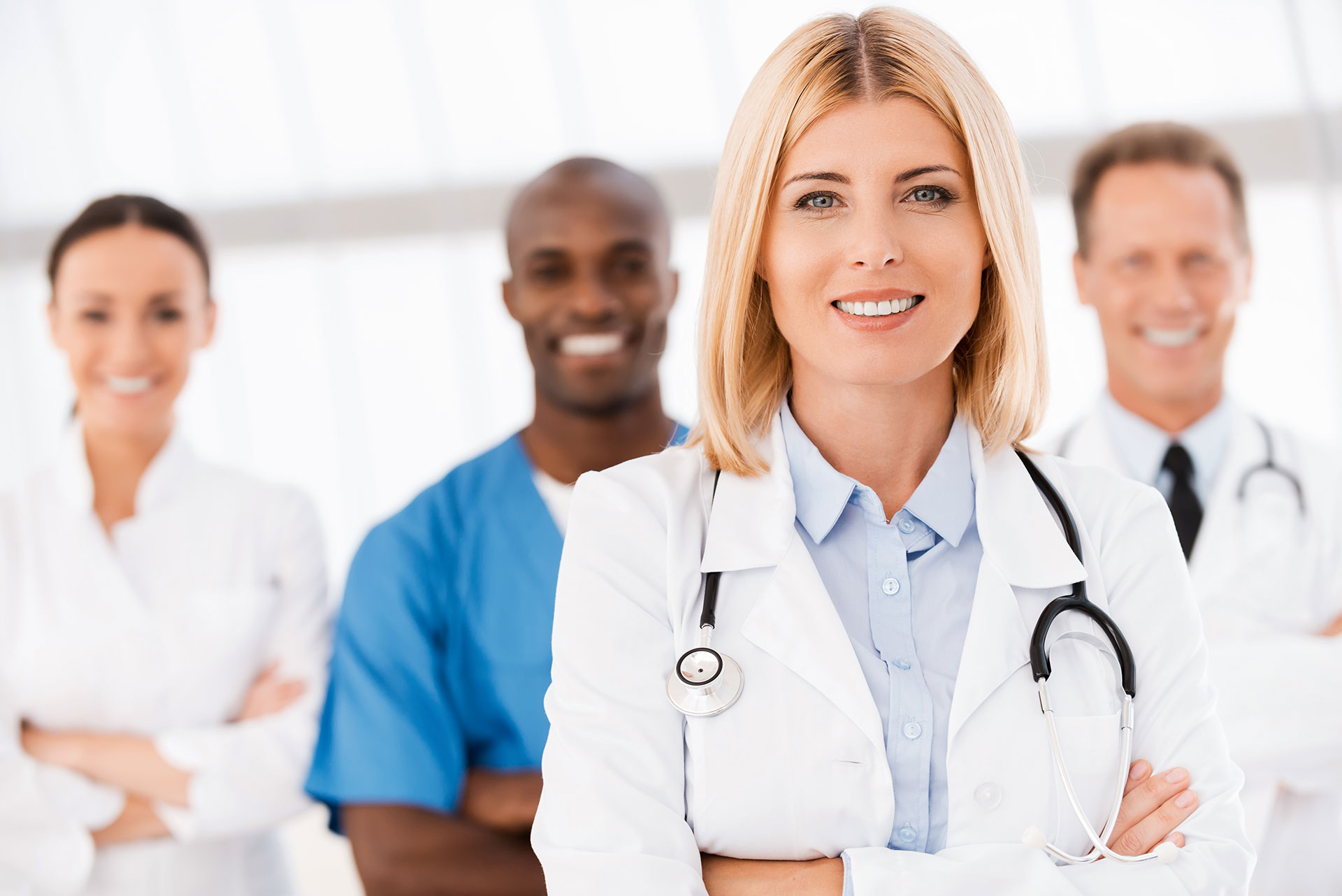 Confident healthcare professionals working together, showcasing Cliniconex’s commitment to improving patient care coordination and seamless communication.